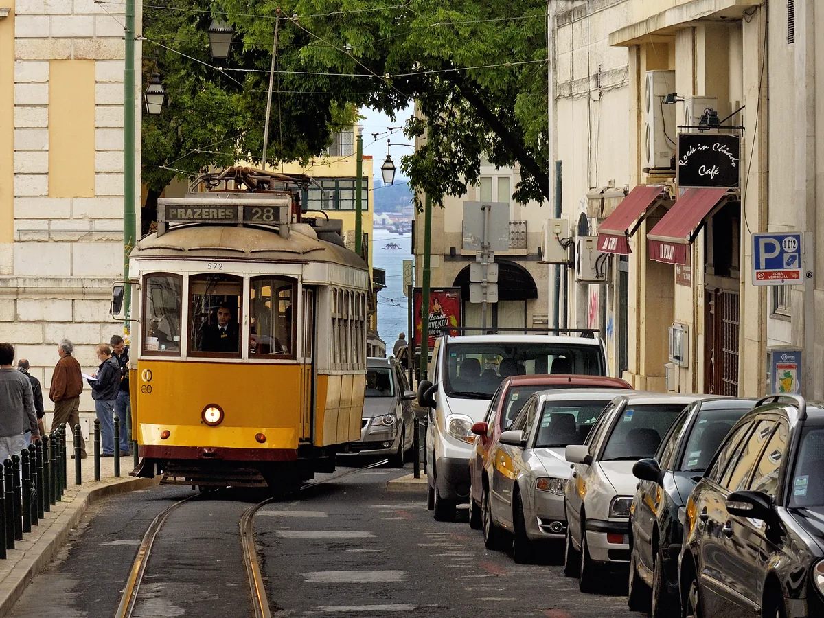 Lisbon tram in historic street